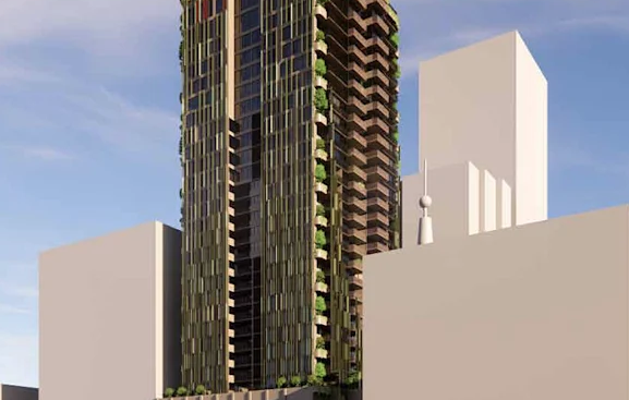 Architectural view showing the Skyneedle dwarfed between proposed high-rise buildings on Manning Street